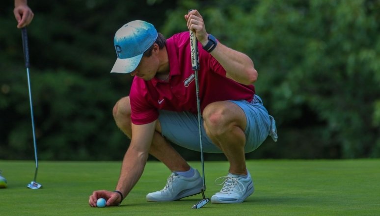 NU golfer on green 